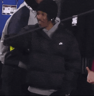 Man In Black Nike Jacket And Beanie GIF