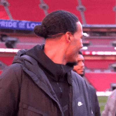 Man In Black Nike Jacket At Stadium GIF
