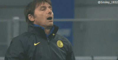 Man In Black Nike Jacket With Yellow Logo GIF