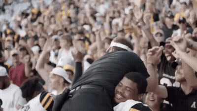 Man In Black Number 3 Jersey Hugging Another Man In Stadium GIF