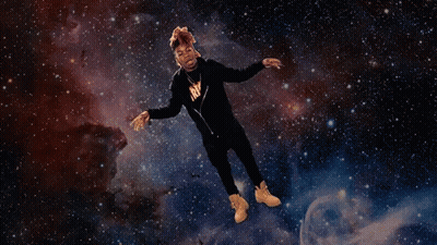 Man in Black NY Jacket Flying Through Air