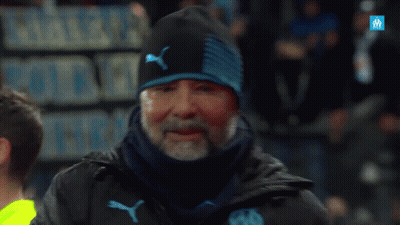 Man In Black Puma Jacket In Front Of Sign Pierre Pour Les Trais GIF