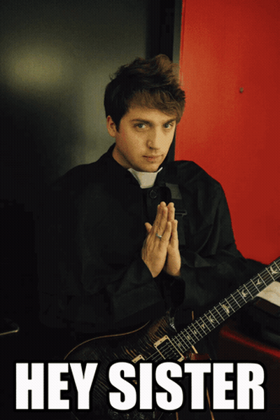 Man In Black Robe Holding Guitar Hey Sister GIF