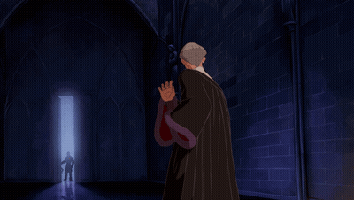 Man In Black Robe Holding Purple Star Object GIF