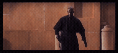 Man In Black Robe With Horns Holding Lightsaber GIF