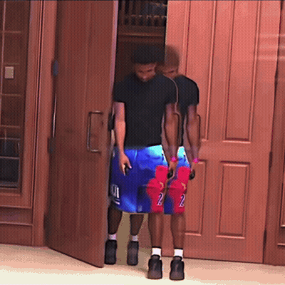 Man In Black Shirt And Blue Shorts With Number 2 GIF
