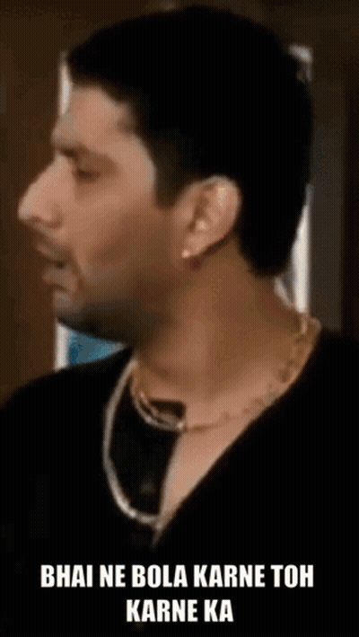 Man In Black Shirt And Gold Chain Talking GIF