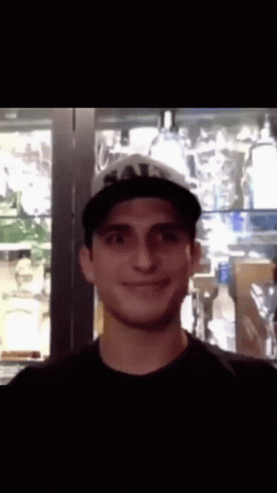 Man In Black Shirt And Hat With Letter T GIF