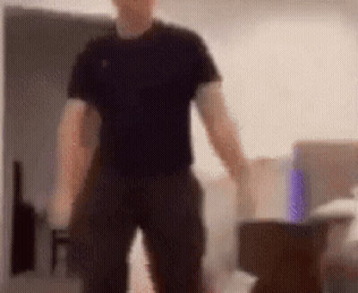 Man In Black Shirt And Pants GIF