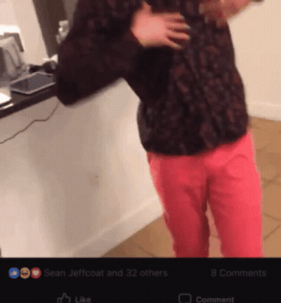 Man In Black Shirt And Pink Pants With Like Button GIF