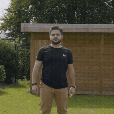 Man In Black Shirt And Tan Pants GIF