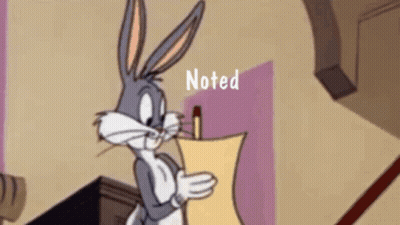 Man In Black Shirt And Tie Holding Pen And Notebook GIF