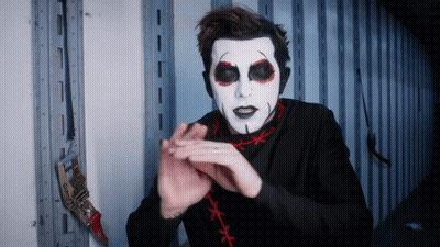 Man In Black Shirt And White Face Paint GIF