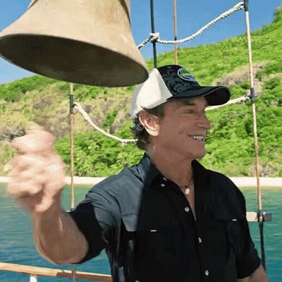 Man In Black Shirt And White Hat Holding Bell GIF