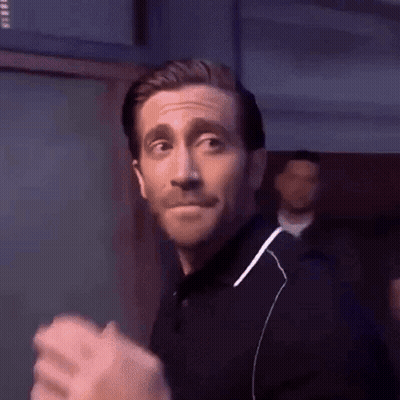 Man In Black Shirt Clapping And Smiling GIF