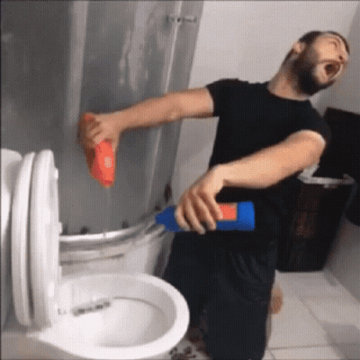 Man In Black Shirt Cleaning Toilet GIF