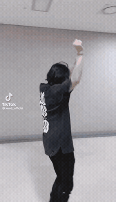 Man In Black Shirt Dancing Arms Up GIF