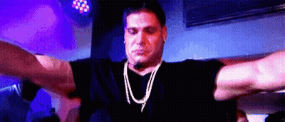 Man In Black Shirt Dancing In Club GIF