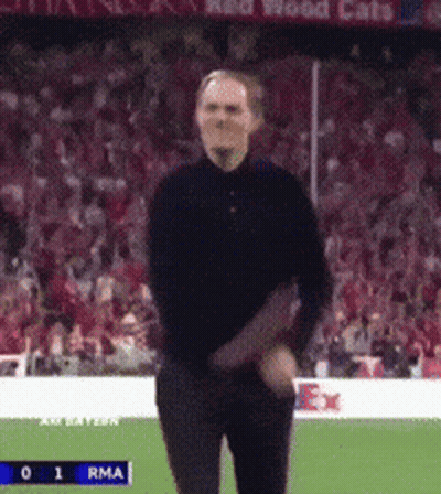 Man In Black Shirt Dancing On Field With RMA Scoreboard GIF
