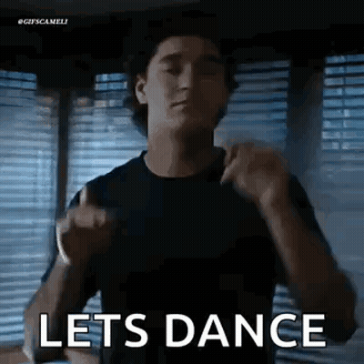 Man In Black Shirt Dancing Says Lets Dance GIF
