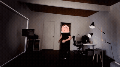 Man In Black Shirt Dancing With Cartoon Character GIF