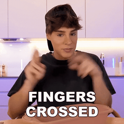 Man In Black Shirt Fingers Crossed GIF