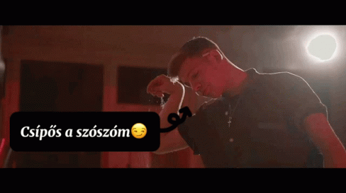 Man In Black Shirt Flexing Muscles GIF