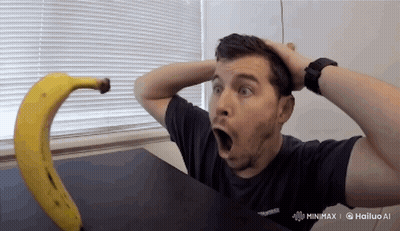 Man In Black Shirt Hailing Banana GIF