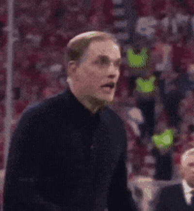 Man In Black Shirt Holding Ball In Front Of Crowd GIF