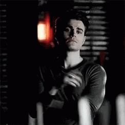 Man In Black Shirt Holding Candle GIF