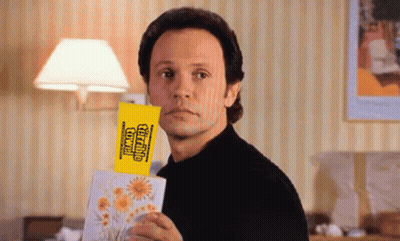 Man In Black Shirt Holding Congratulations Card GIF