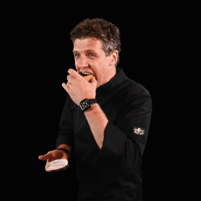 Man In Black Shirt Holding Food GIF