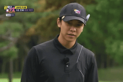 Man In Black Shirt Holding Golf Club With Question Mark GIF