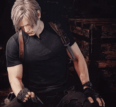 Man In Black Shirt Holding Gun And Gloves GIF