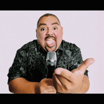 Man In Black Shirt Holding Microphone Making Funny Face GIF