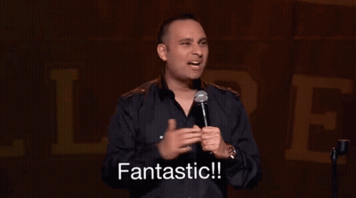 Man In Black Shirt Holding Microphone Says Fantastic GIF