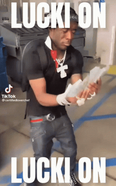 Man In Black Shirt Holding Money GIF