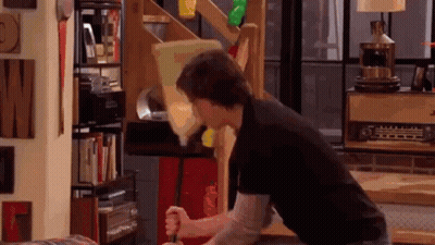 Man In Black Shirt Holding Screwdriver GIF