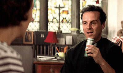 Man In Black Shirt Holding Soda Can GIF