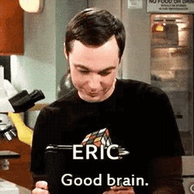 Man In Black Shirt Holding Tablet Says Eric Good Brain GIF
