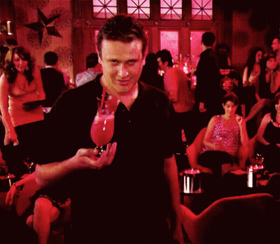 Man In Black Shirt In Crowded Bar GIF