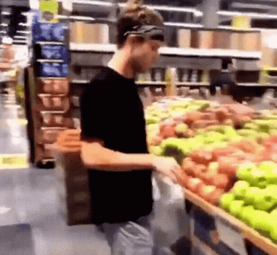Man In Black Shirt In Front Of Apple Display GIF