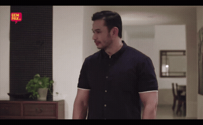 Man In Black Shirt In Front Of Gem Bak Sign GIF