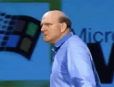 Man In Black Shirt In Front Of Hotel Madero Wall GIF