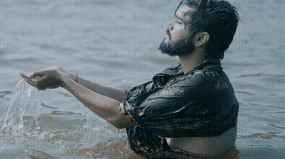 Man In Black Shirt In Water GIF