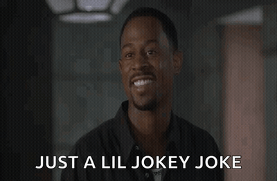 Man In Black Shirt Laughing Just A Lil Jokey Joke GIF