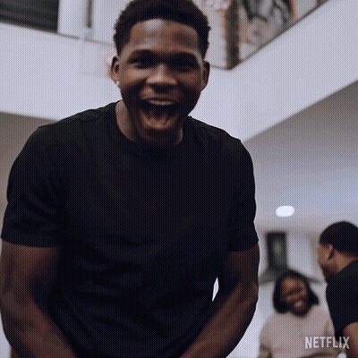 Man In Black Shirt Laughing Netflix Logo GIF