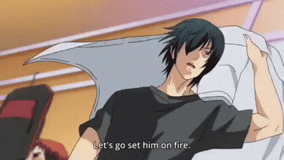 Man In Black Shirt Laying On Bed Says Let's Go Set Him On Fire GIF