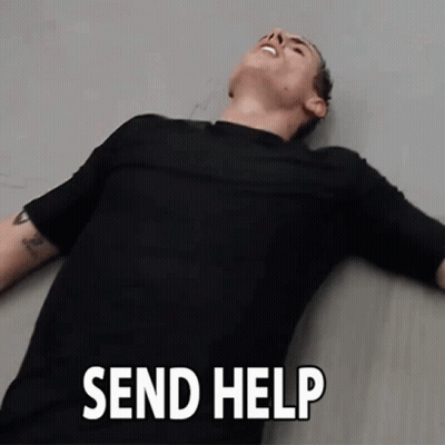 Man In Black Shirt Lying On Floor Send Help GIF