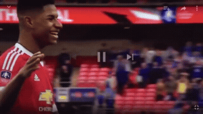 Man In Black Shirt Makes Funny Face To Crowd GIF
